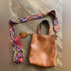Small shoulder bag with decorative 2 sided strap